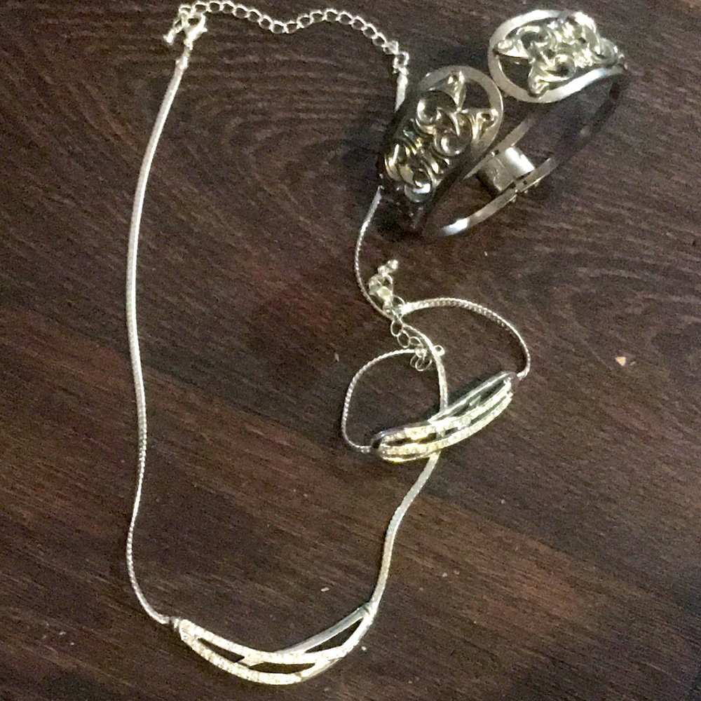 Necklace earrings and two bracelets